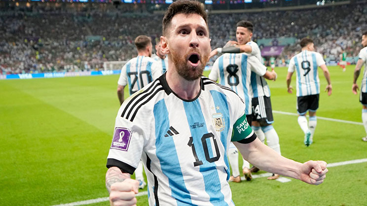 Lionel Messi merayakan gol ketiga Argentina di final Piala Dunia 2022